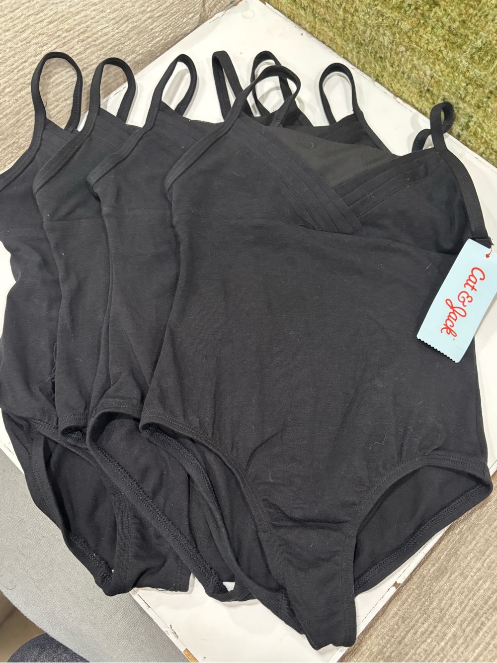 Cat & Jack Black Seamless V-Neck Tank Bodysuits – 4 Pack